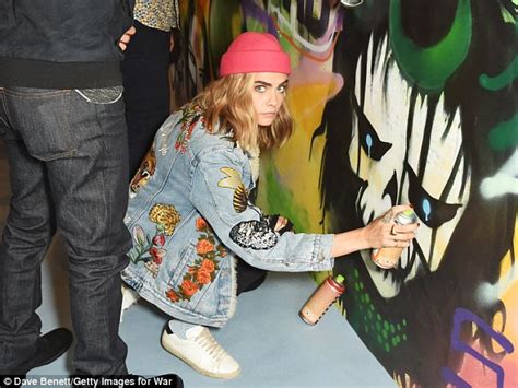 Cara Delevingne And Margot Robbie Get Creative With Spray Paint At