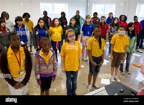 Middle School Students Warm Up In Choir Practice At Rappaport Academy