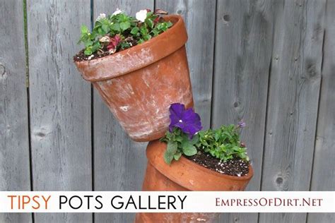 Tipsy Pots Gallery Also Known As Topsy Turvy Towers Rusty Garden