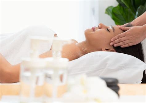 Face Massage Attractive Young Woman Getting Spa Massage Treatment At Spa Salon Stock Image