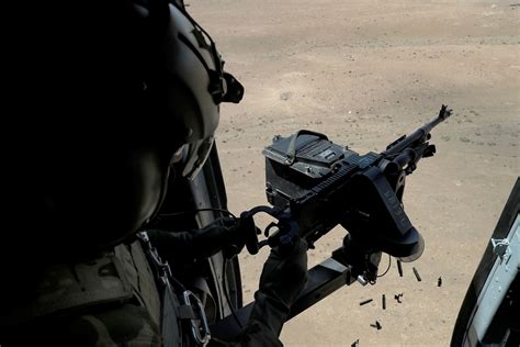 Potd Afghan Air Force Door Gunner Over Kabul The Firearm Blog