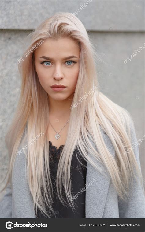 Stunning Blue Eyed Blond Woman Portrait Stock Photo By ©vladeephoto