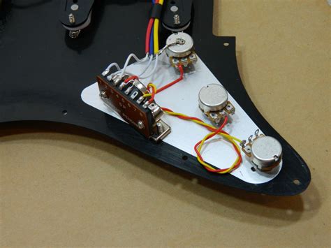 In this case you would clip the wire at the point. Ironstone Guitar Pickup Wiring - Electric Guitar Pickups by Ironstone