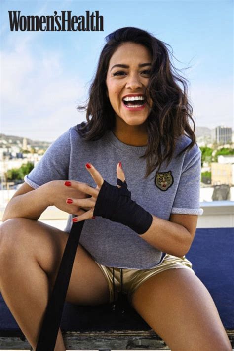 Gina Rodriguez Takes The Plunge In Red Bathing Suit And Strikes Boxing