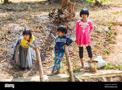 Three Young Burmese Children By Inle Lake Near Indein Village Shan