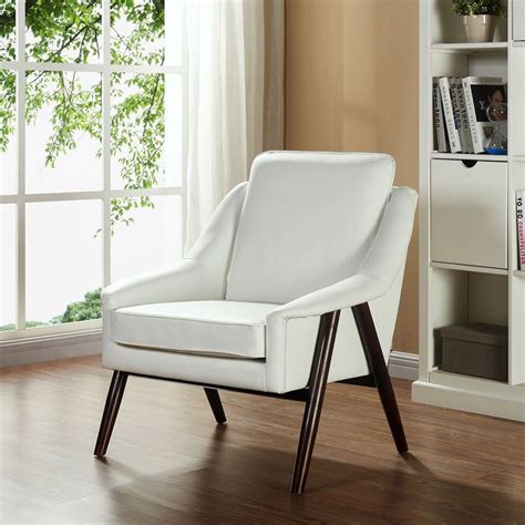 The curvaceous iron frame of this chair makes it an attractive accent piece. Four Ways The Right Accent Chair Will Amp Up Your Style ...