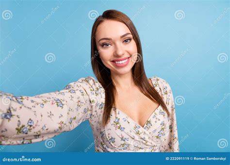 Photo Of Sweet Brown Hairdo Young Lady Do Selfie Wear Floral Blouse Isolated On Blue Color