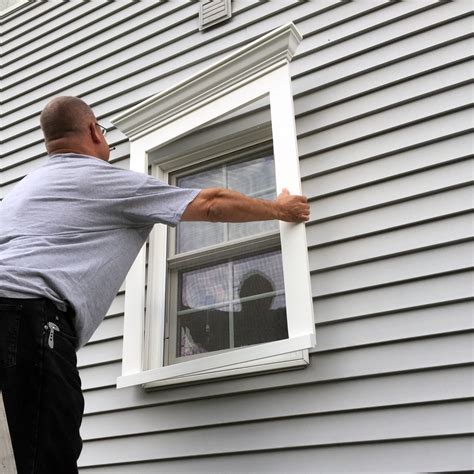 ClipTrim comes pre-assembled and installs over the existing vinyl siding. | Window trim exterior