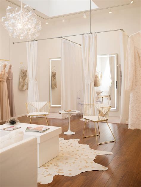 Bridal Salon With White And Gold Décor Clothing Boutique Interior
