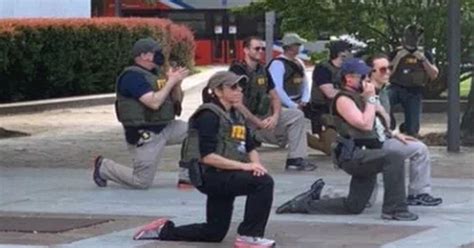 Wrong Wray Disturbing Photos Emerge Of Fbi Agents Taking A Knee To