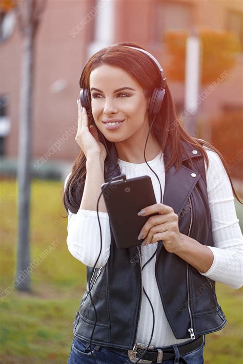 Woman Listening To Music On Headphones Stock Image F0289798