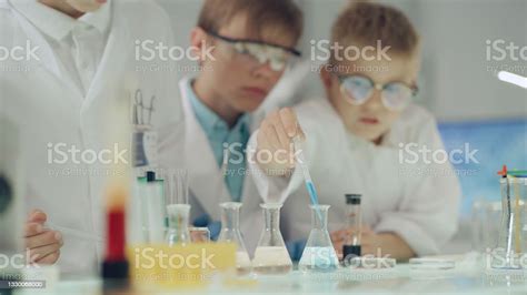 Kids Conducting Science Experiment Laboratory Interior Pouring Multi
