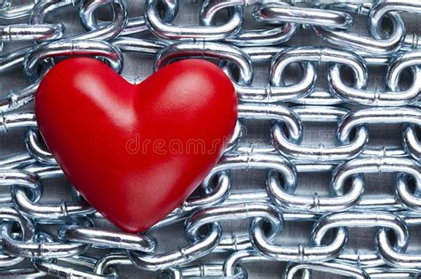 Red Plastic Heart On Steel Chains Background Stock Image Image Of