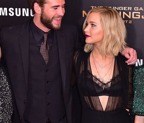 jennifer lawrence and liam hemsworth kissed off screen