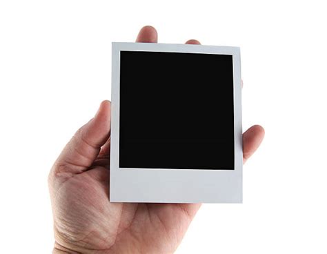 Hand Holding Polaroid Stock Photos Pictures And Royalty Free Images Istock