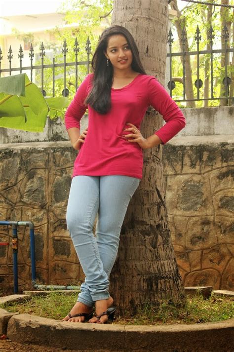 Malavika Menon Photos In Jeans At Vizha Movie Press Meet