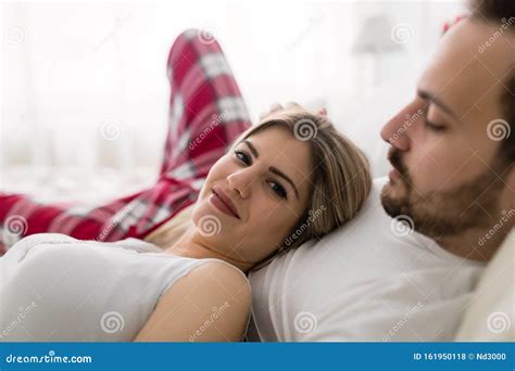 Young Attractive Couple Having Romantic Time In Bed Stock Photo Image