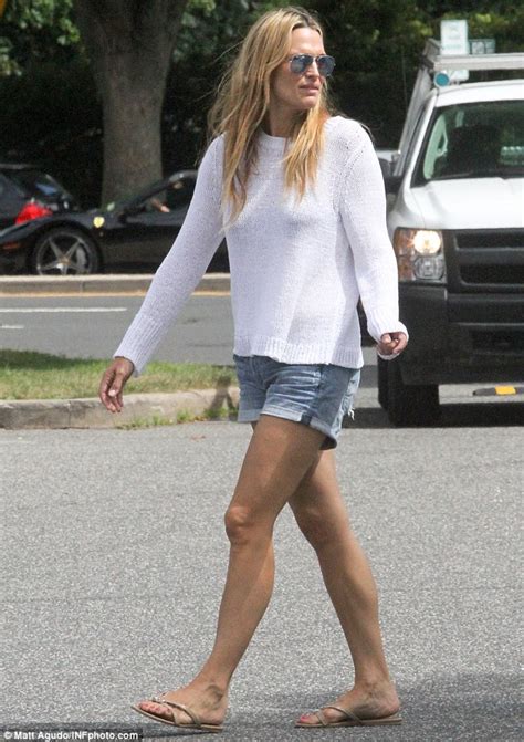 Molly Sims Displays The Sculpted Legs That Made Her Famous In Cut Off