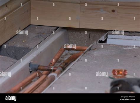 Central Heating Pipes In Channel In Concrete Floor Stock Photo Alamy