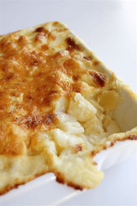 If you enjoy baked potatoes from your favorite steakhouse restaurants, you will recall they have a crispy skin with a soft fluffy inside. Cheesy Potato Bake - Bargain Mums