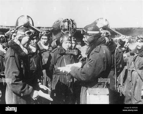 Pilots Of The Chinese Air Force Receive Instructions From Officers