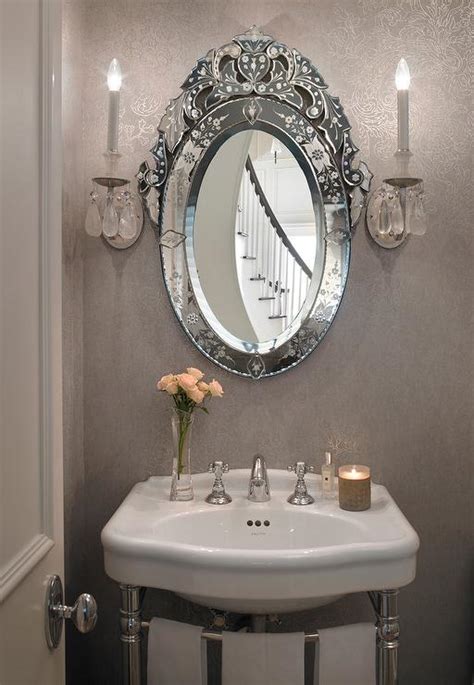 Gray French Powder Room With Oval Venetian Mirror French Bathroom