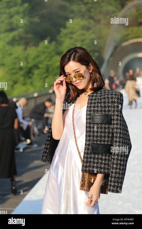 Hong Kong Actress And Model Janice Man Poses As She Arrives At Louis
