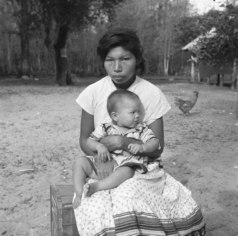 Florida Memory Seminole Woman Holding Child In Her Lap