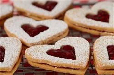 I now refuse to cut corn kernels off the cob without a kitchen towel. Ina Garten's Linzer Cookies