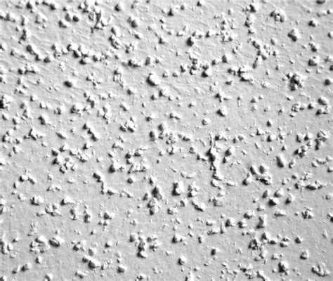 Its bright white cottage cheese texture. Popcorn Ceiling Removal and Repair - John Grey Painting