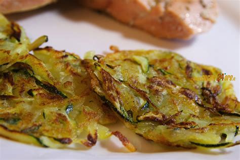 Ho servito con del salmone cotto in padella. Rosti di Patate e Zucchine 10 - Ricette di Cucina
