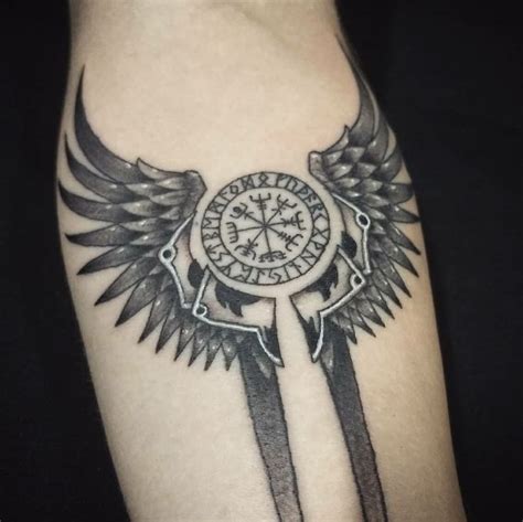 Submit your ideas and our team of artists will work with you until your tattoo is perfect. Valkyrie wings and vegvisir. Done by @amandaclemes. # ...