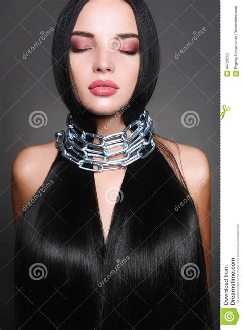 Beautiful Woman With Shining Hair In Steel Chain Stock Photo Image Of
