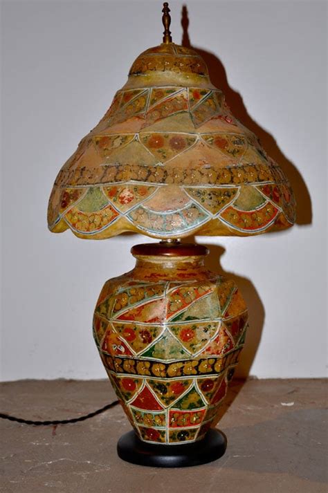 Handmade camel skin lamps have also the prominent value in the field of handicrafts and this item has also exported to other countries and people admire it due many of the items are included in this type of handicraft. Vintage Camel SkinTable Lamp at 1stdibs