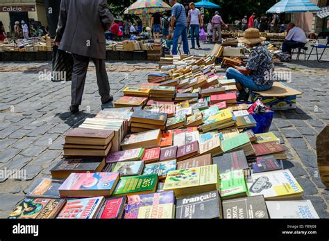 Woman Selling Books At Antique And Used Books Market In Lviv Ukraine
