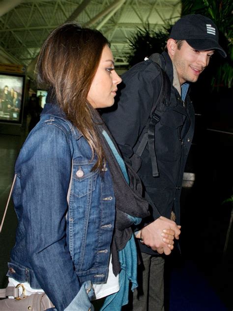 Mila Kunis And Ashton Kutcher Holds Hands At La Airport E Online Ca