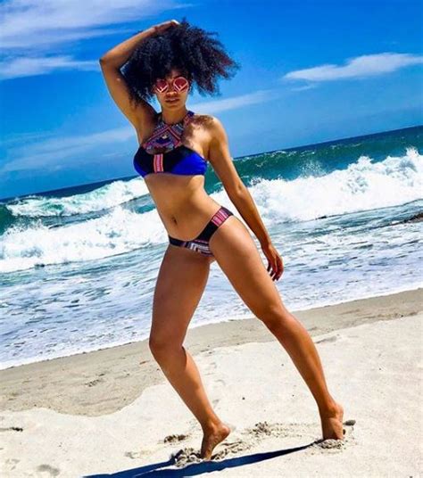 pearl thusi hits the beach poses in bikini photos illuminaija