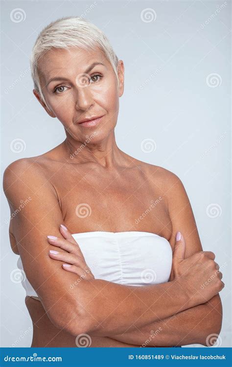 Serious Middle Aged Woman With Crossed Arms Posing On Camera Stock Image Image Of Lovely