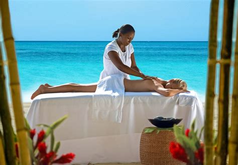 enjoy a massage on the beach with red lane®spa sandals resorts