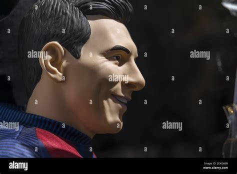A Rubber Doll Representing Lionel Messi Seen In The Window Of A