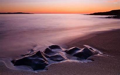 Sand Sea Sunset Rocks Buried Calm Wallpapers