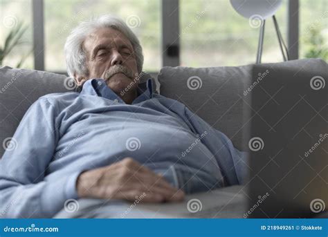 Elderly Man Sleeping On The Couch Stock Image Image Of Indoors Apartment 218949261