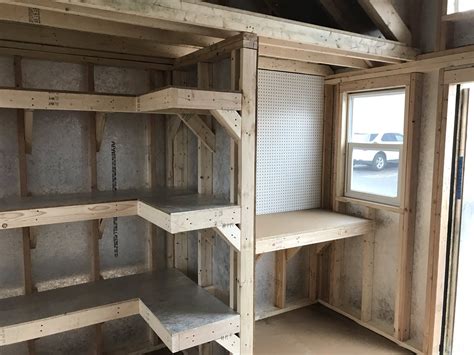Shelving Pegboards A Workbench And A Loft This Storage Shed Is
