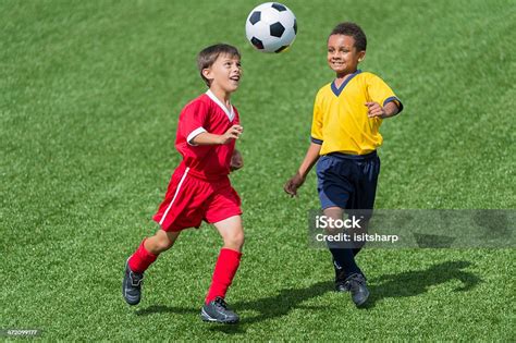 Two Young Boys Playing Football Stock Photo Download Image Now Istock