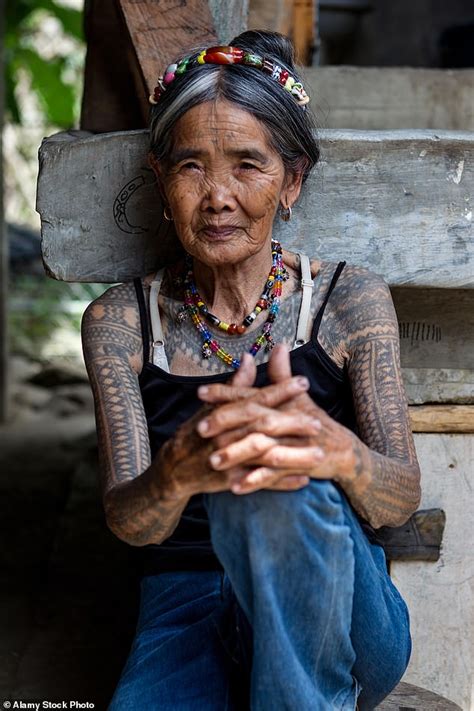 Vogue S Beauty Issue Features Year Old Filipino Tattoo Artist On The Cover Daily Mail Online
