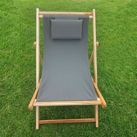 The wooden chairs can be folded to save space when not in use. Teak Folding Beach Chair - IKsun Teak Patio Furniture SALE