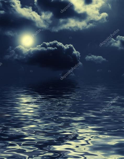 Nightly Clouds Over The Water Stock Photo By ©stavklemsale 76655011