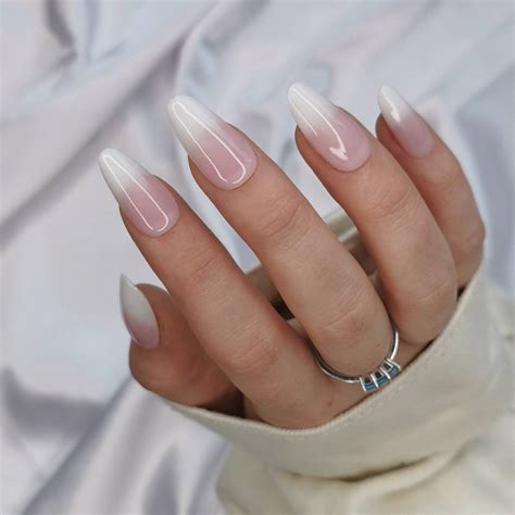Transform Your Nails With Stunning Pink To White Ombre Coffin Nails