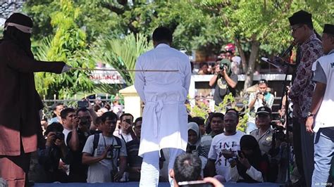 indonesian gay couple flogged as mob cheers