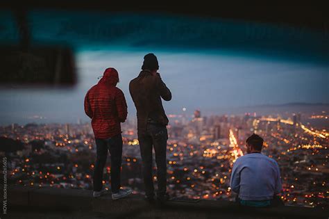 Three Young Travelers Overlooking San Francisco At Dusk By Howl